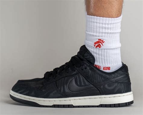 nike dunk low black canvas